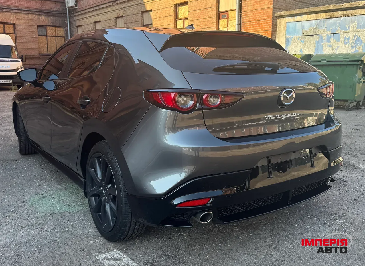 Mazda 3 - фото 6