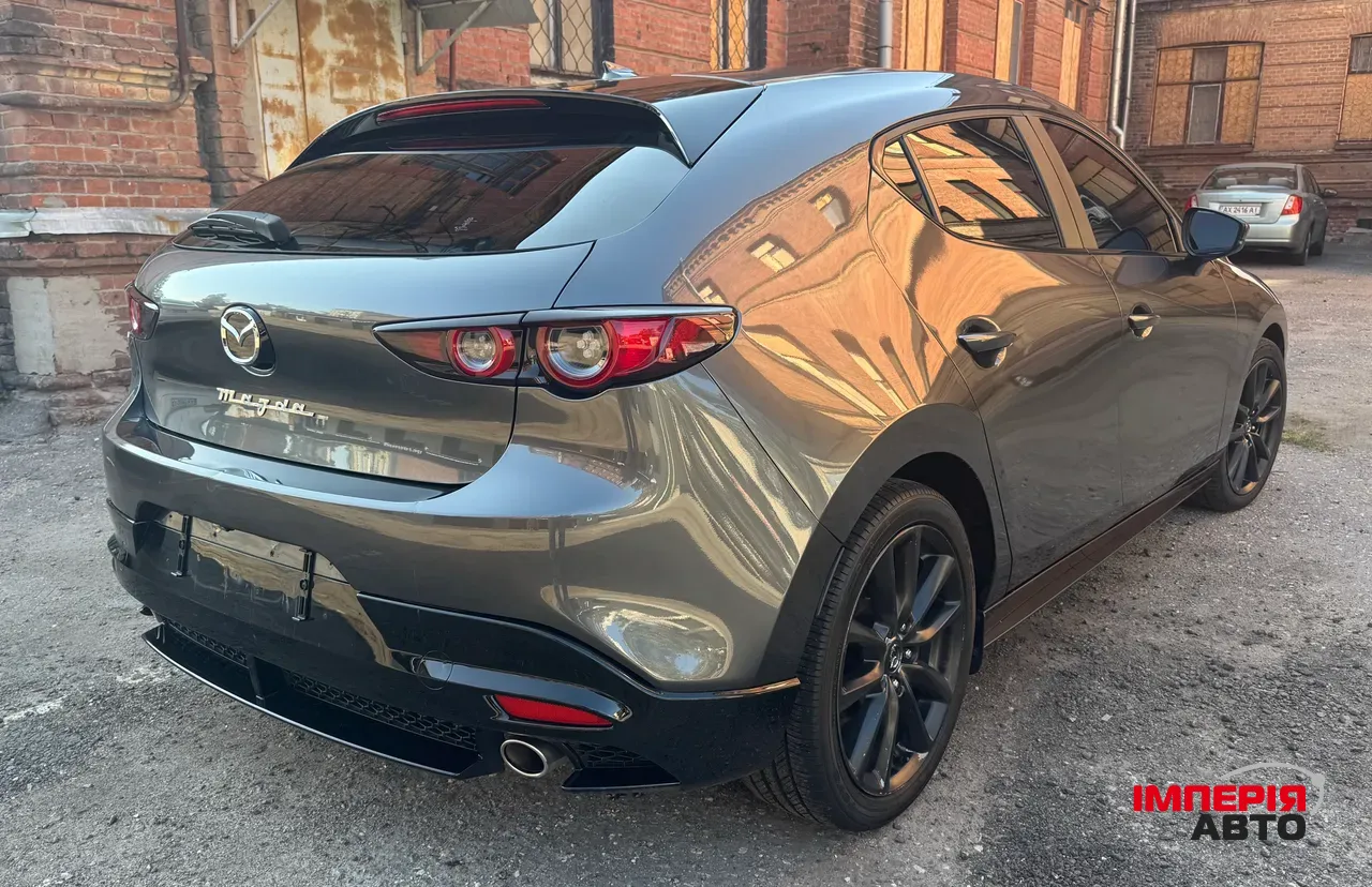 Mazda 3 - фото 1