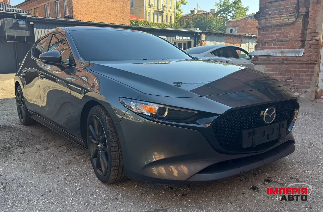 Mazda 3 - фото 4