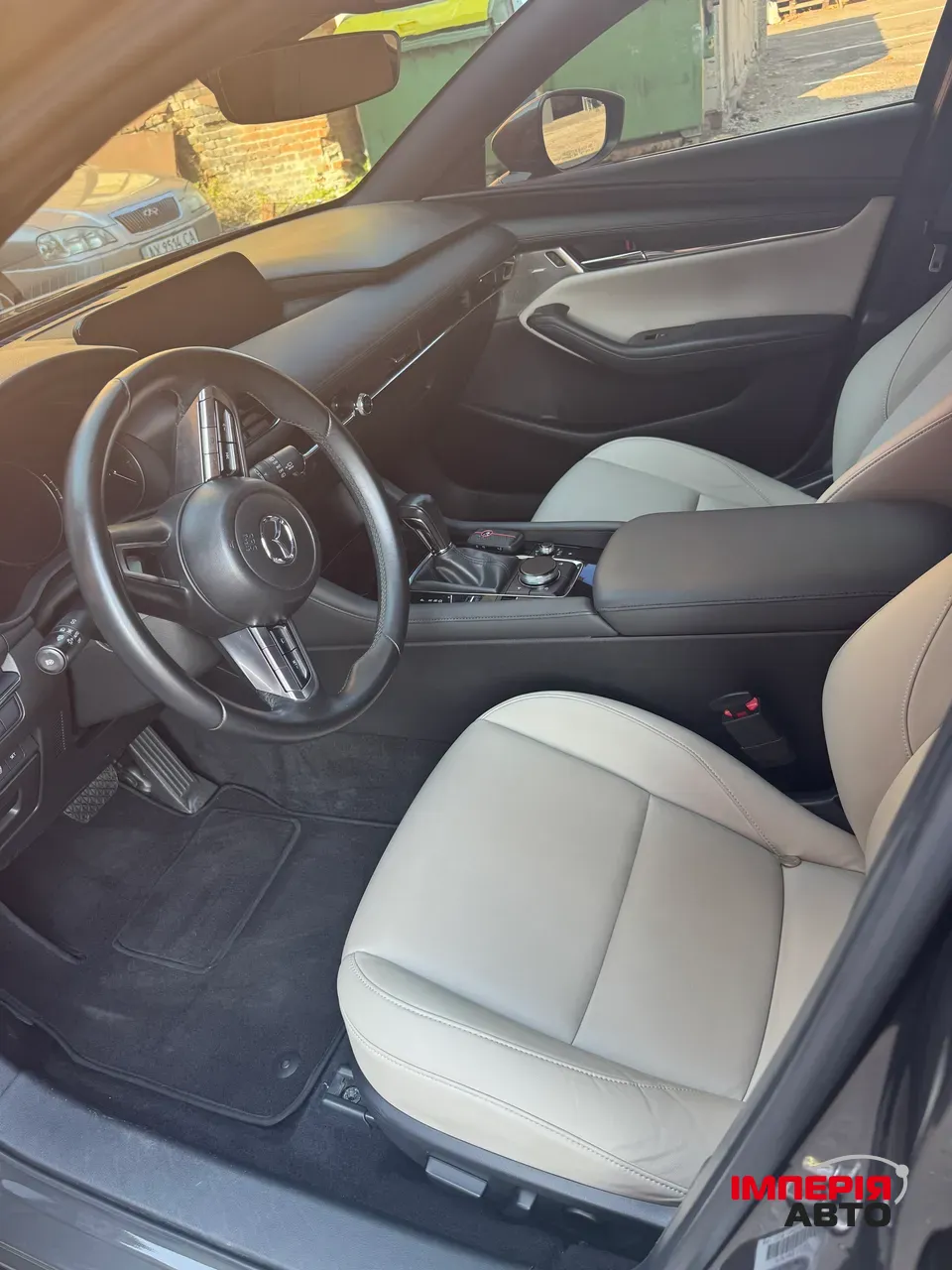 Mazda 3 - фото 7