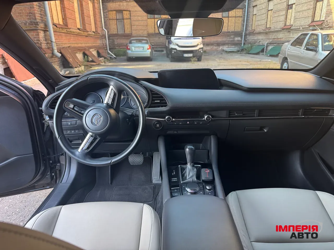 Mazda 3 - фото 2