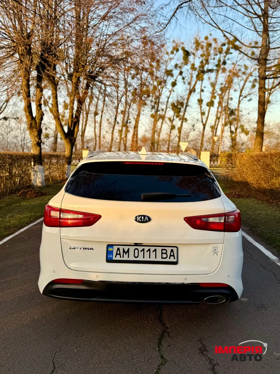 Kia Optima - фото 5