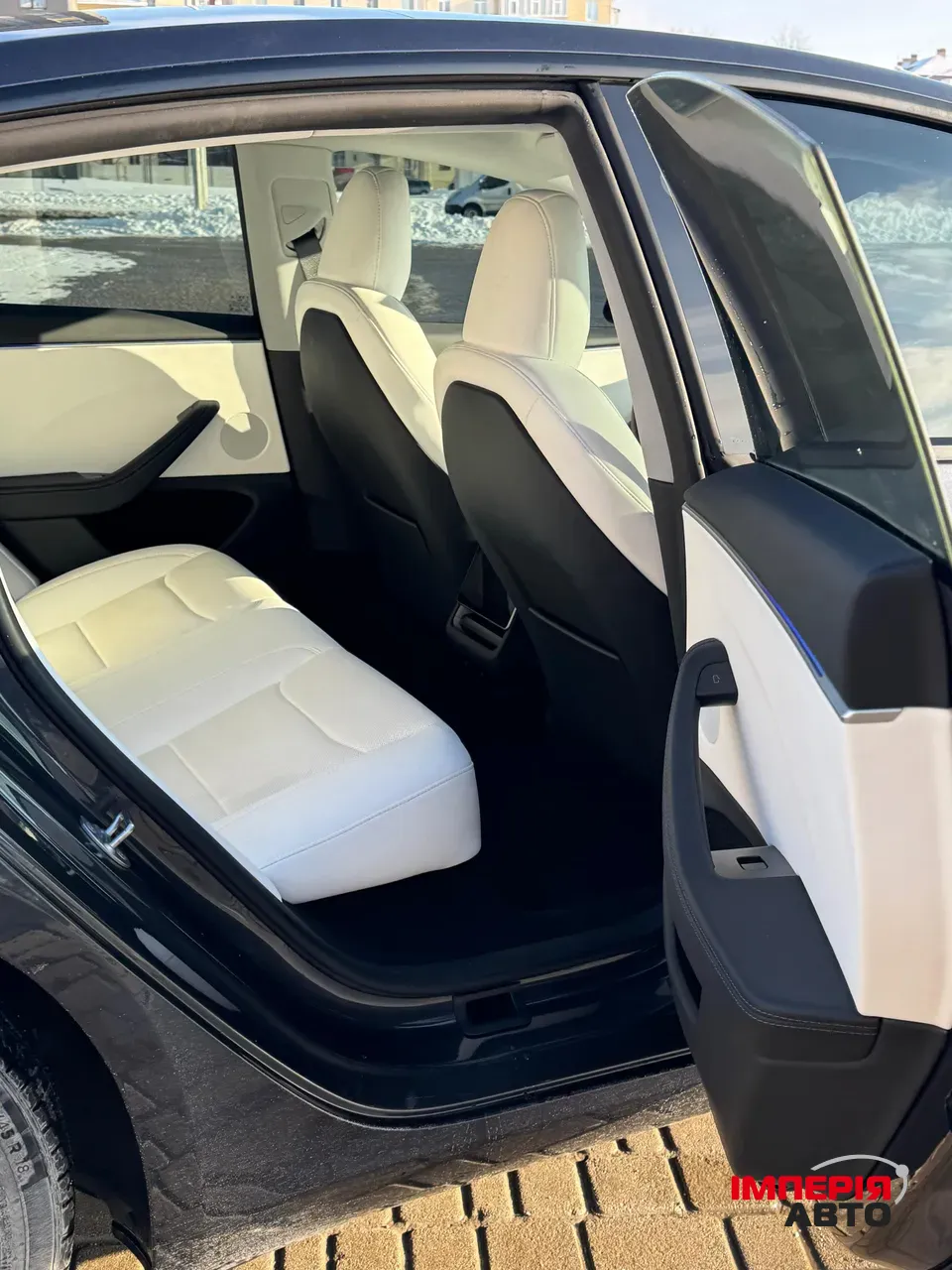 Tesla Model 3 - фото 10