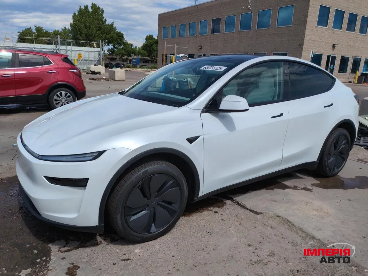 Tesla Model Y - фото 1