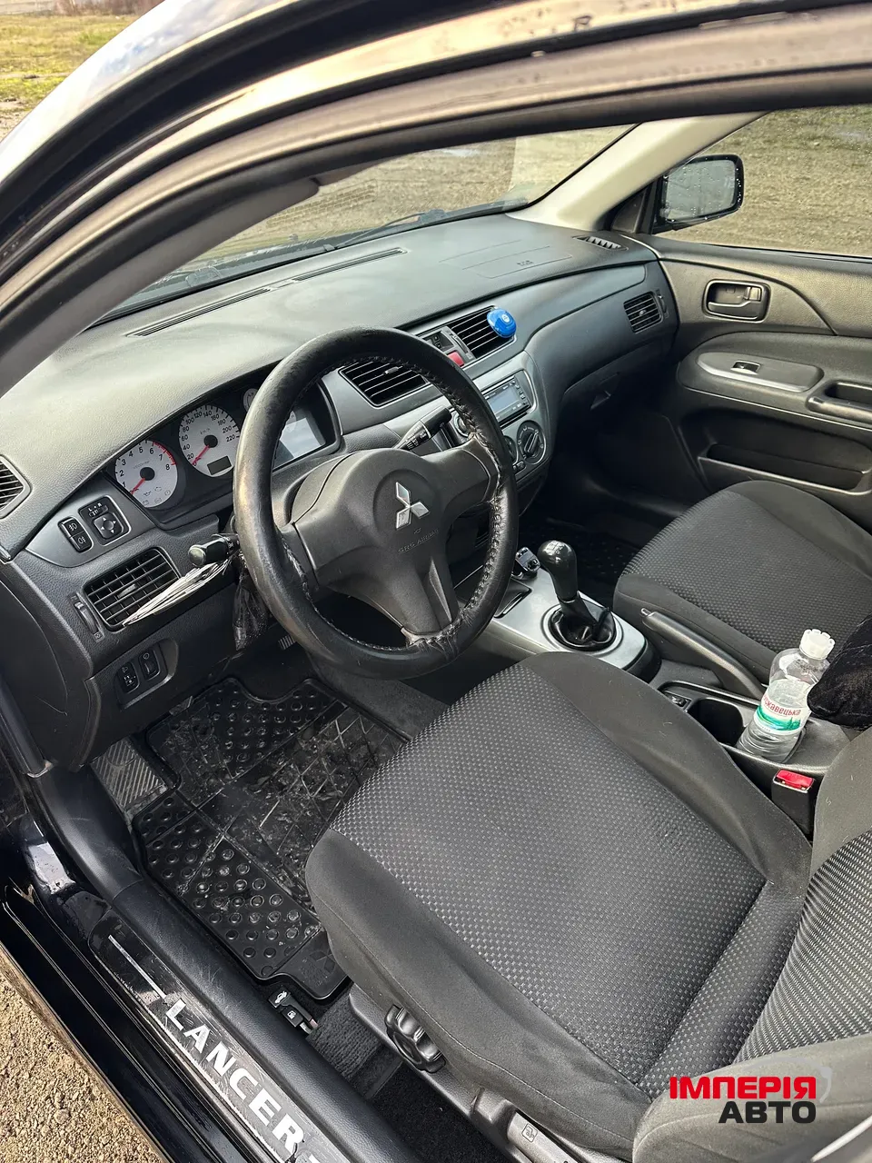 Mitsubishi Lancer - фото 8