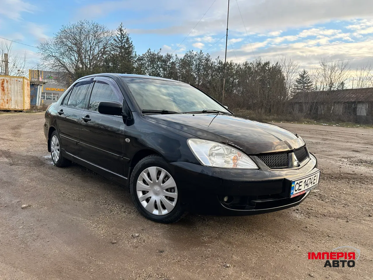 Mitsubishi Lancer - фото 1