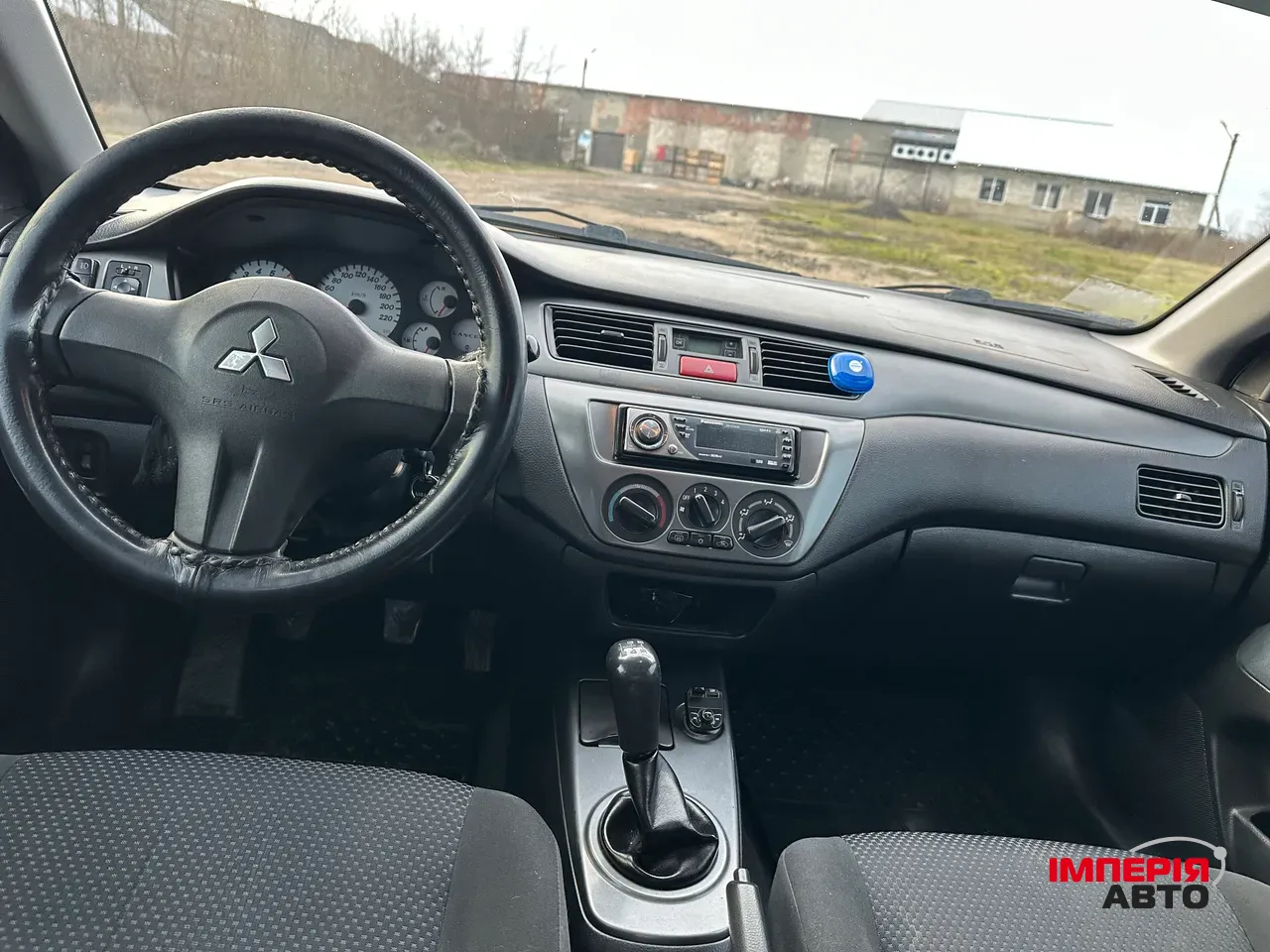 Mitsubishi Lancer - фото 10