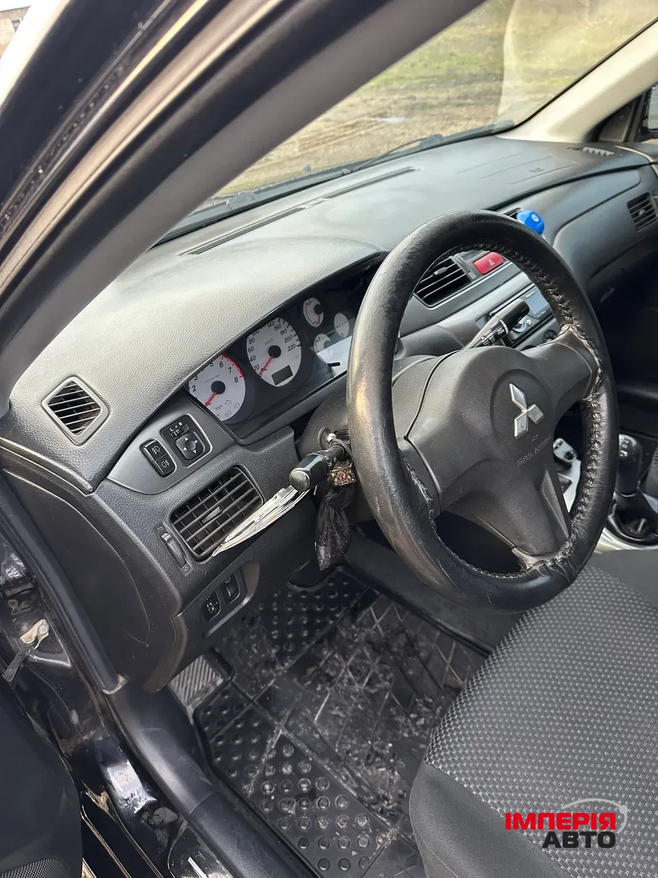 Mitsubishi Lancer - фото 11