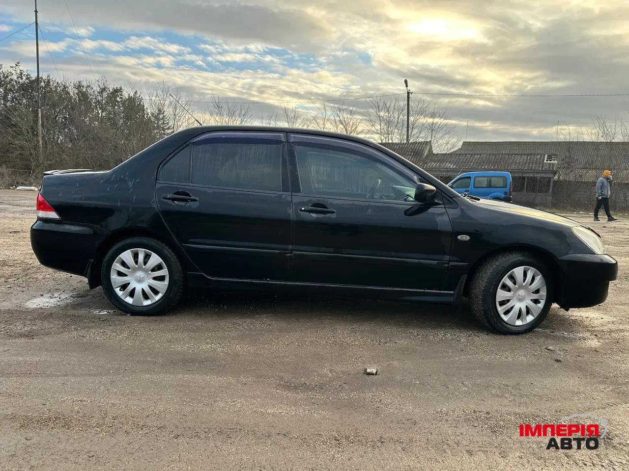 Mitsubishi Lancer - фото 7