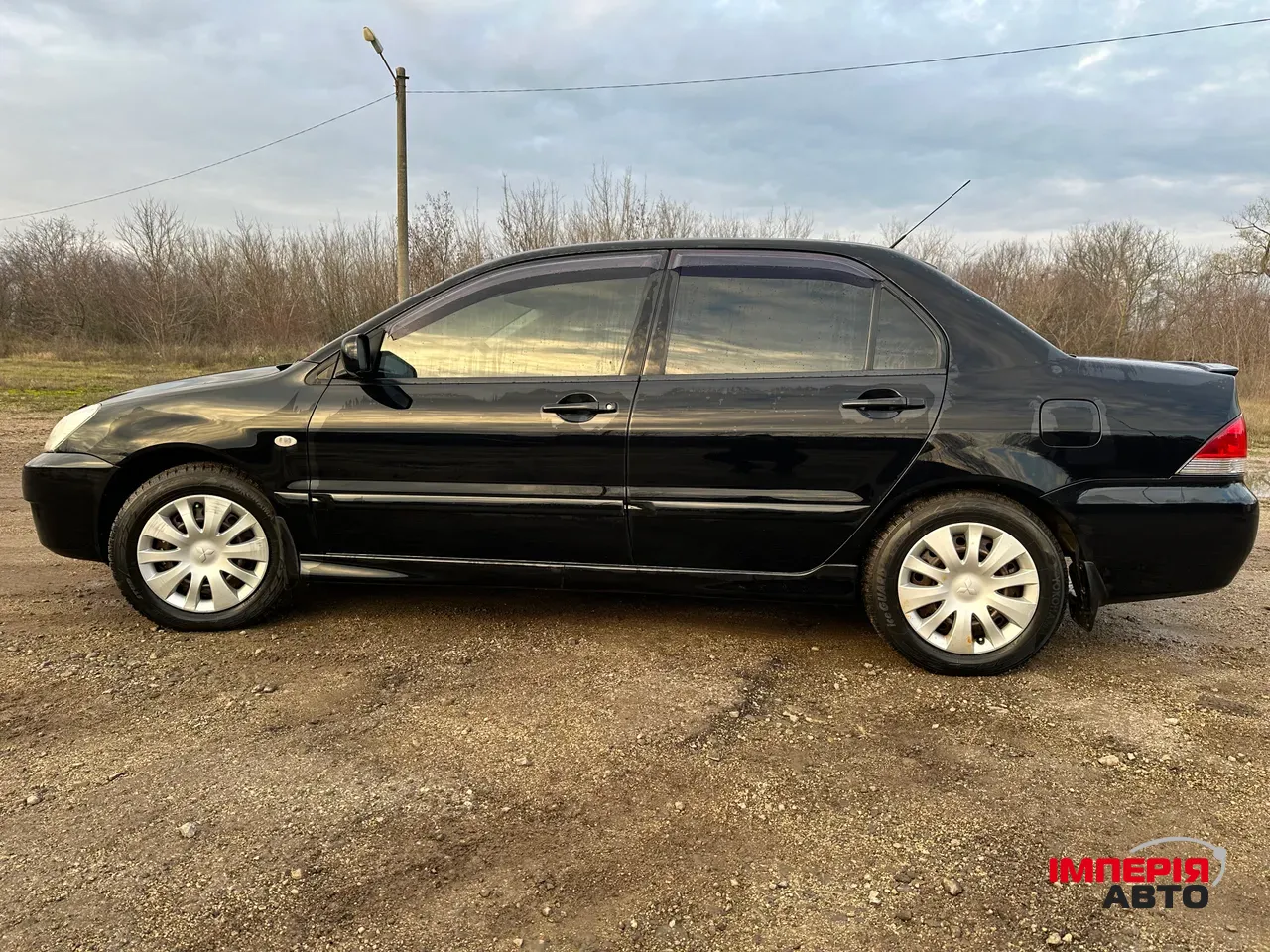 Mitsubishi Lancer - фото 3