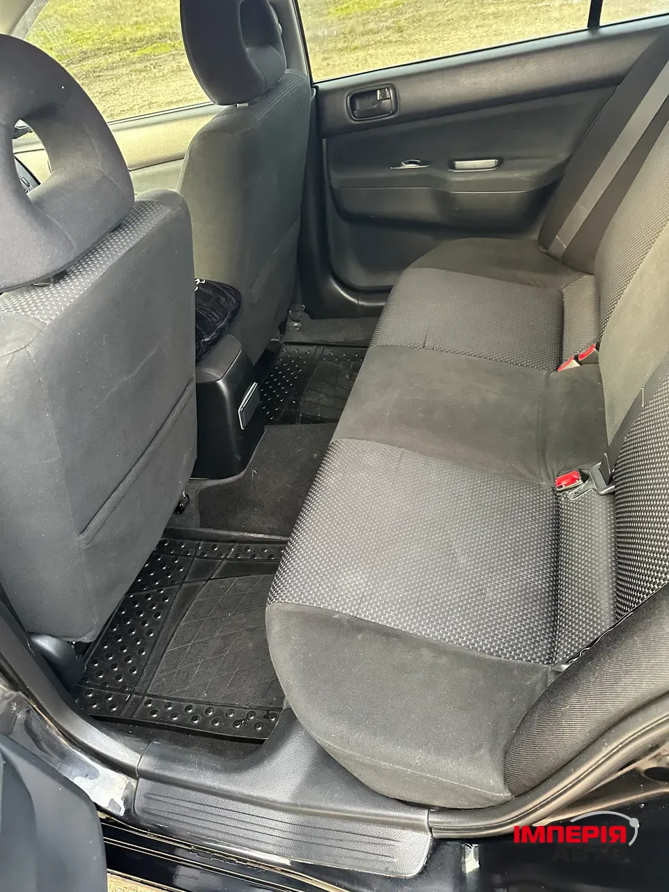 Mitsubishi Lancer - фото 9