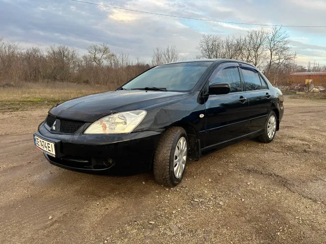 Mitsubishi Lancer - фото 2