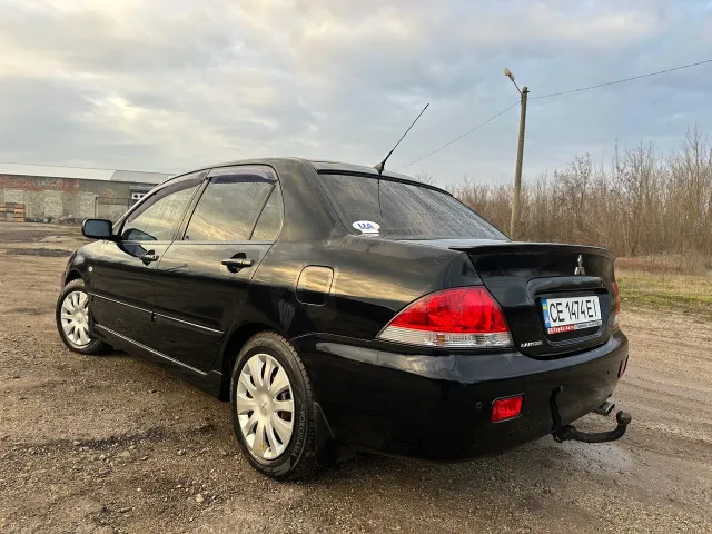 Mitsubishi Lancer - фото 5