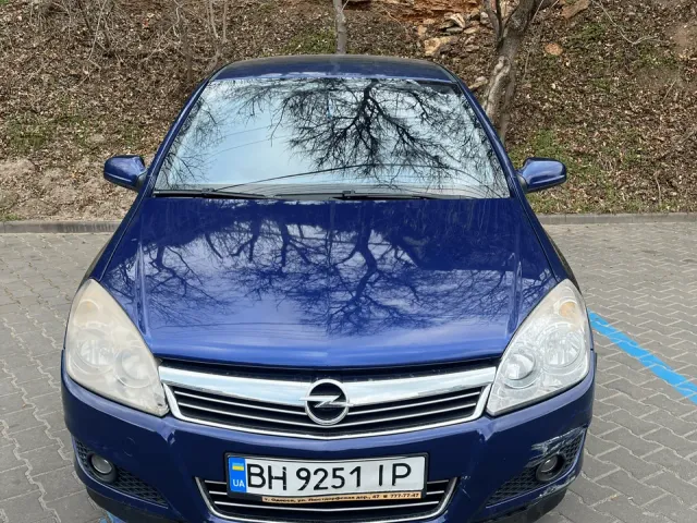 Opel Astra - фото 1