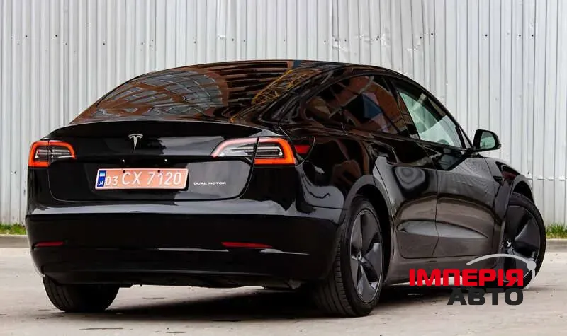 Tesla Model 3 - фото 11