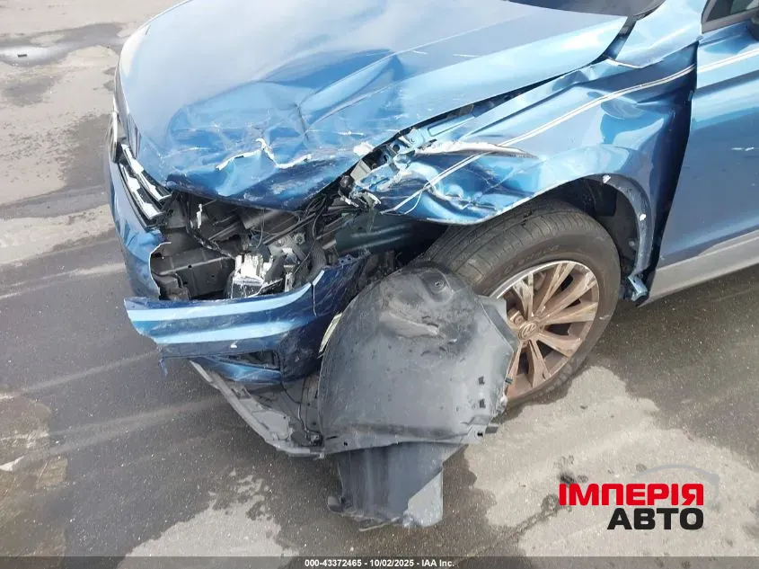 Volkswagen Tiguan - фото 11