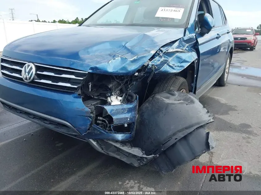 Volkswagen Tiguan - фото 12