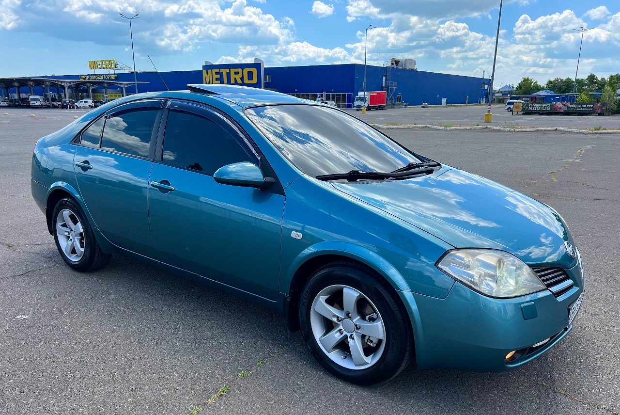 Nissan Primera - фото 9