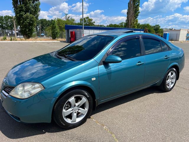 Nissan Primera - фото 1