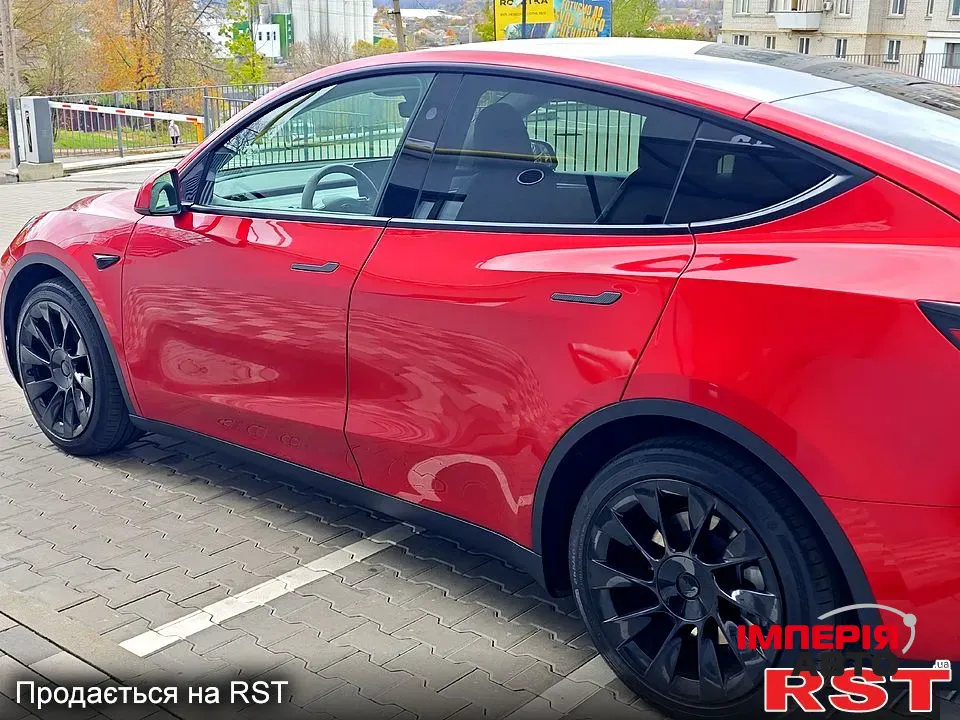 Tesla Model Y - фото 7
