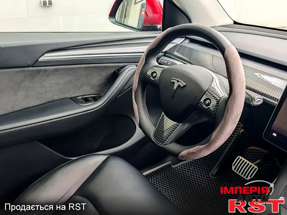 Tesla Model Y - фото 12
