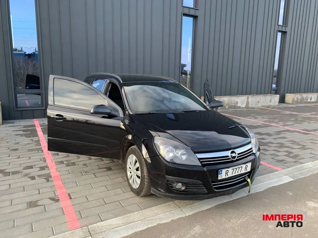 Opel Astra - фото 1