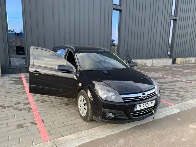Opel Astra - фото 1