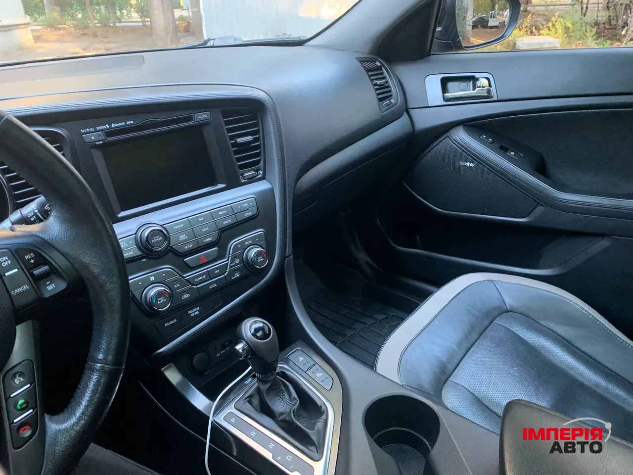 Kia Optima - фото 14