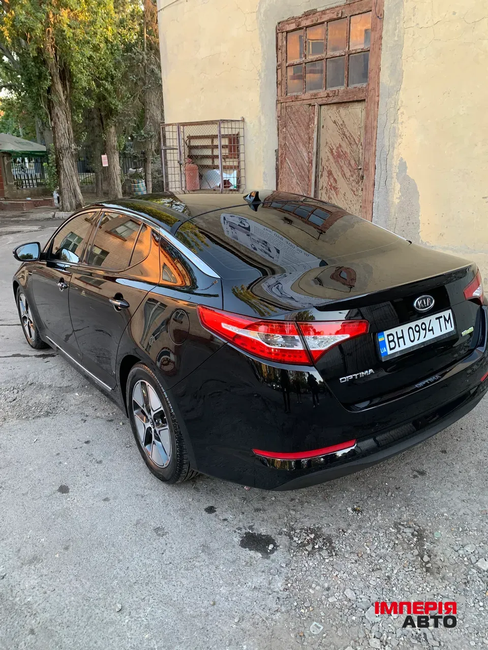 Kia Optima - фото 5