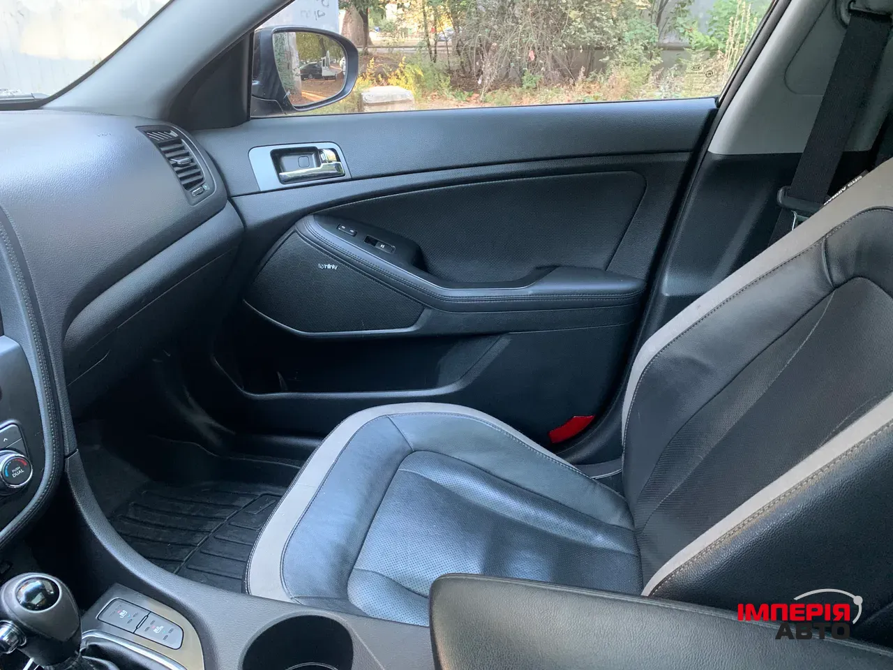 Kia Optima - фото 13