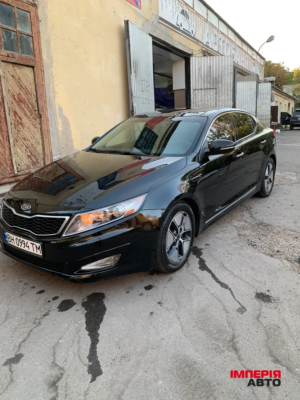Kia Optima - фото 4