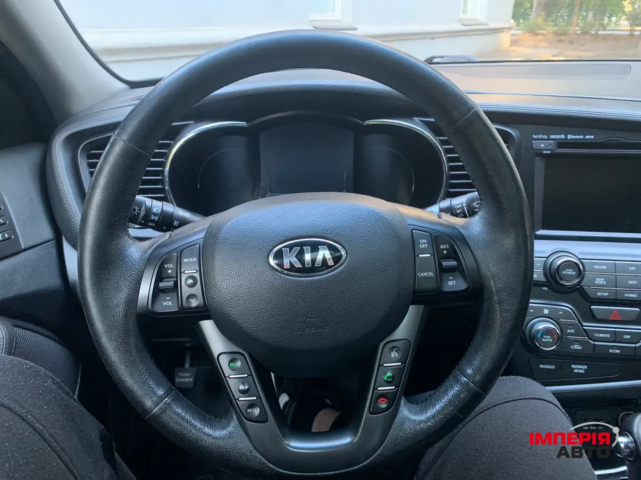 Kia Optima - фото 9