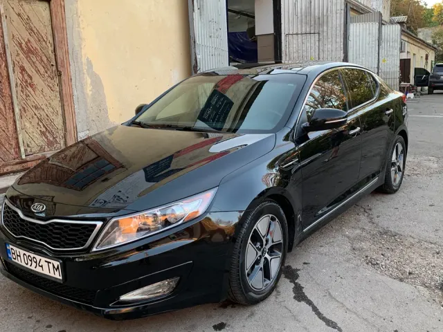 Kia Optima - фото 4