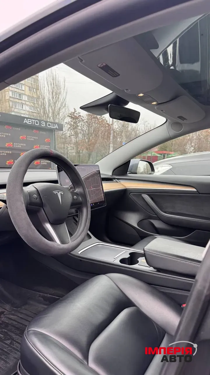 Tesla Model 3 - фото 11