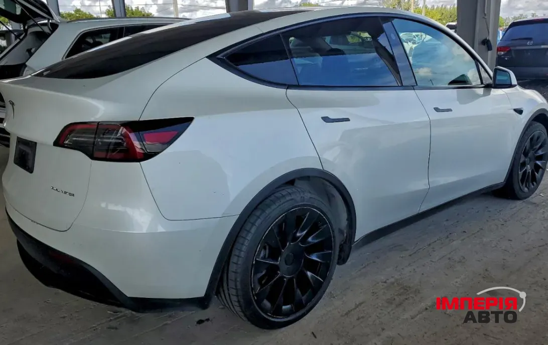 Tesla Model Y - фото 6