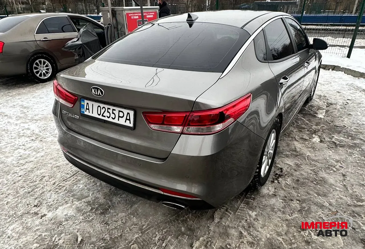 Kia Optima - фото 10