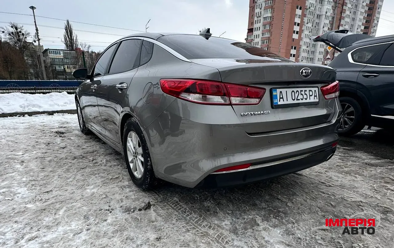 Kia Optima - фото 11