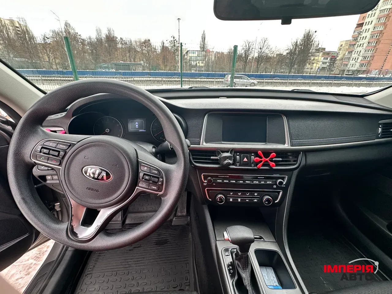 Kia Optima - фото 8