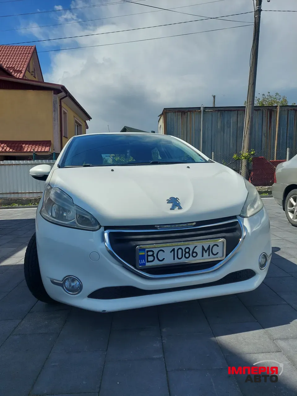 Peugeot 208 - фото 1