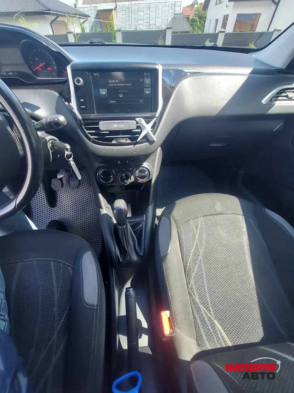 Peugeot 208 - фото 10