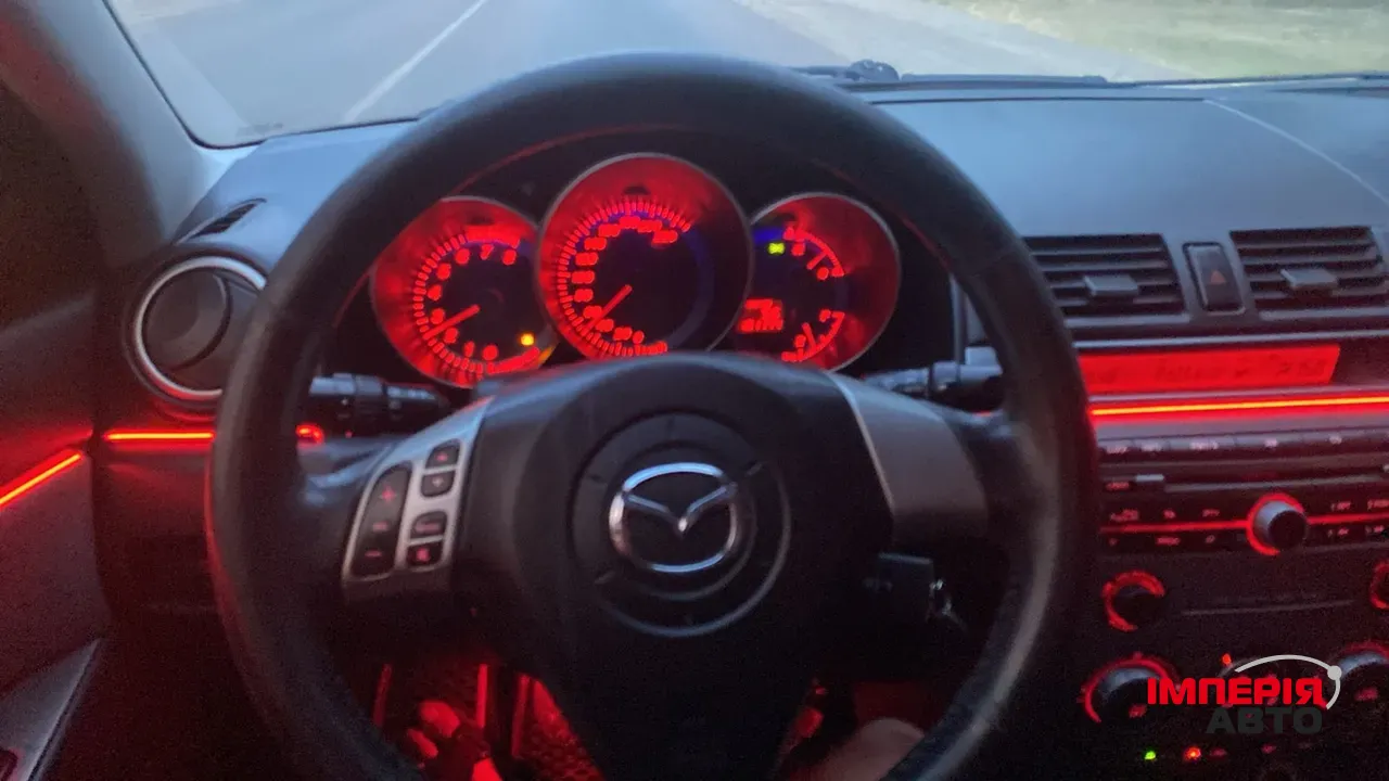 Mazda 3 - фото 6