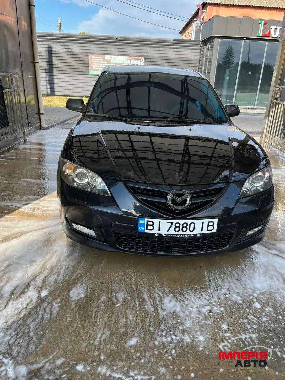 Mazda 3 - фото 1