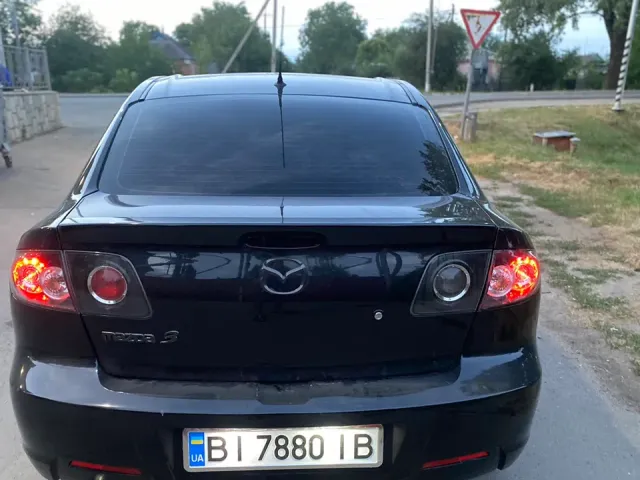 Mazda 3 - фото 4