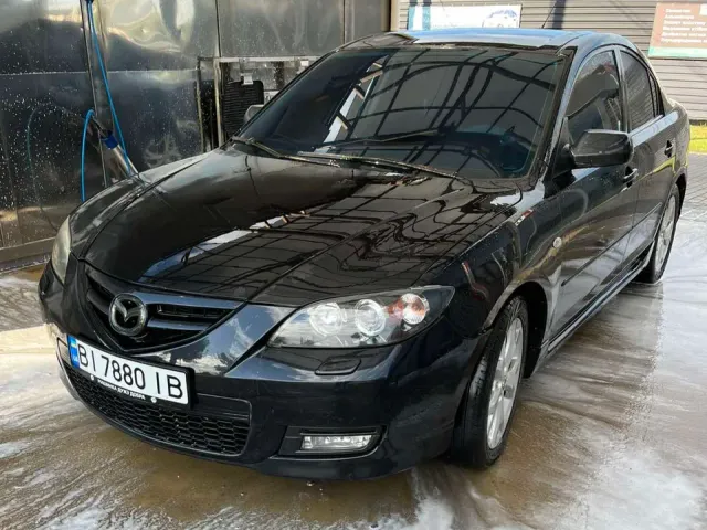 Mazda 3 - фото 2
