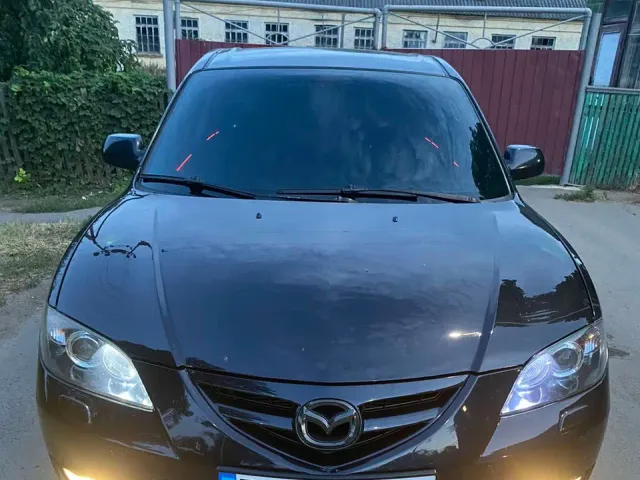 Mazda 3 - фото 5