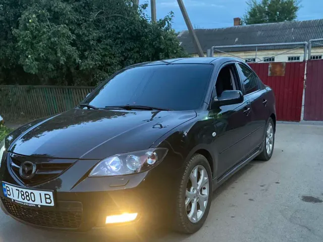 Mazda 3 - фото 3