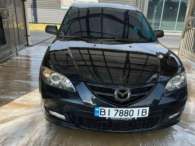 Mazda 3 - фото 1