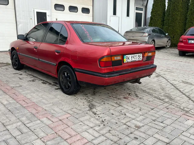 Nissan Primera - фото 4