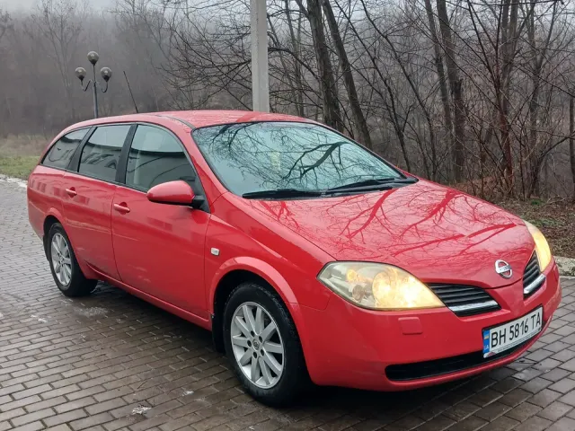 Nissan Primera - фото 5