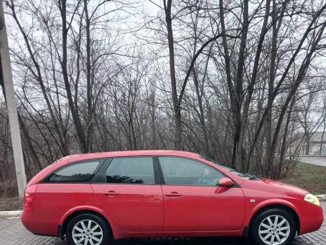 Nissan Primera - фото 4